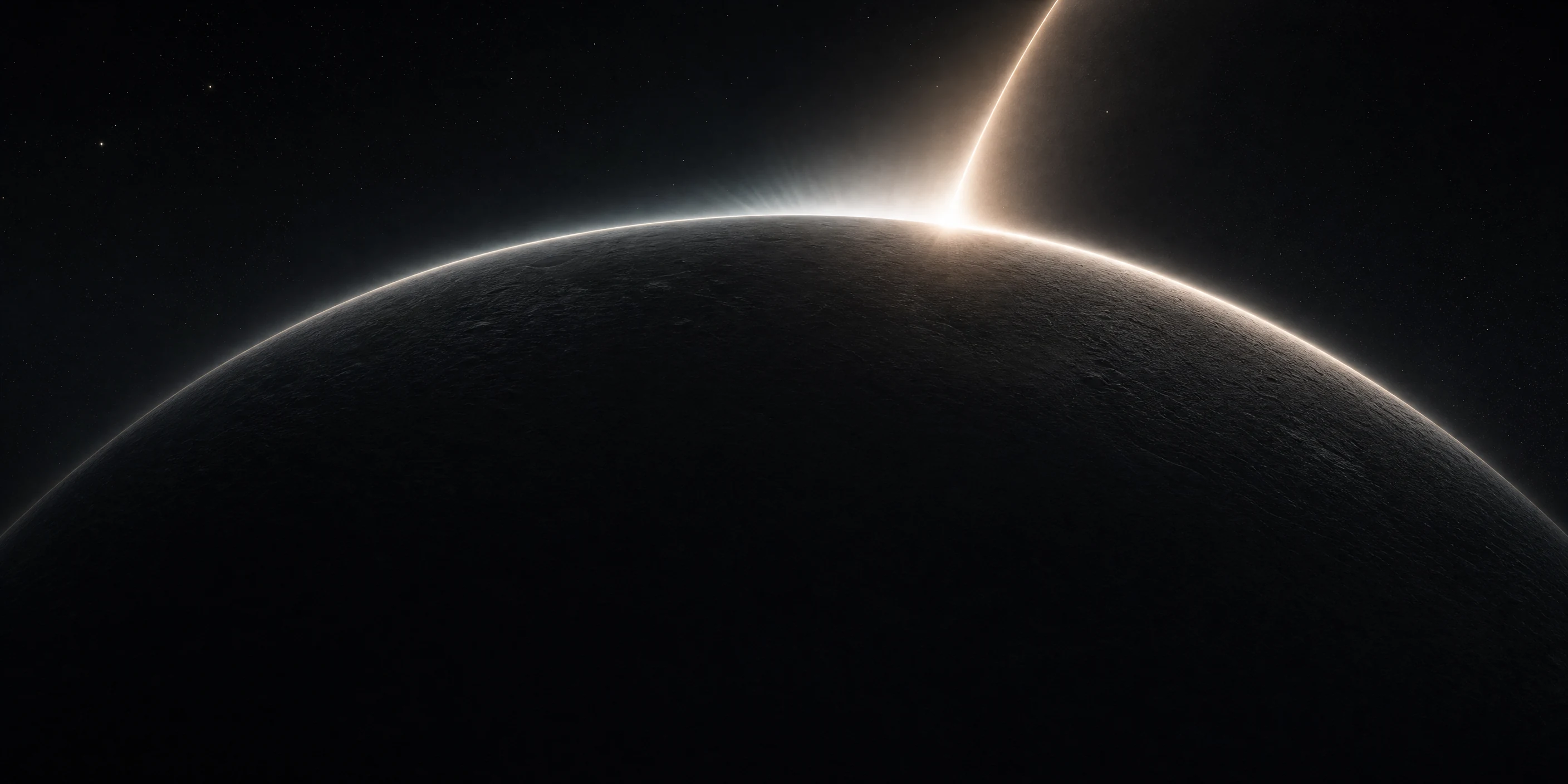Warm light breaking over a dark curved horizon